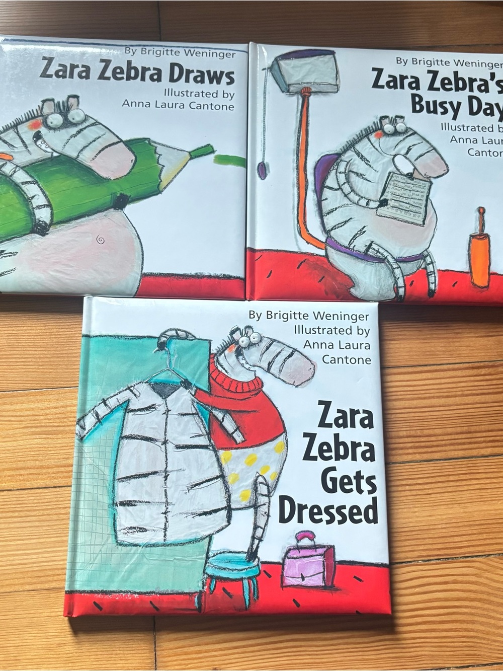 Lot of 3 Zara Zebra Books by Brigitte Weninger - Gets Dressed, Draws, Busy Day